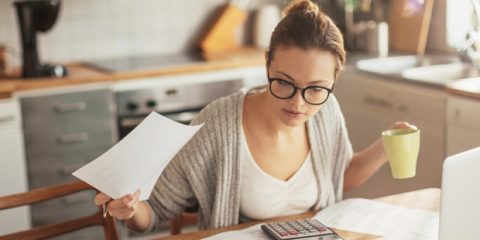 woman calculating her finances